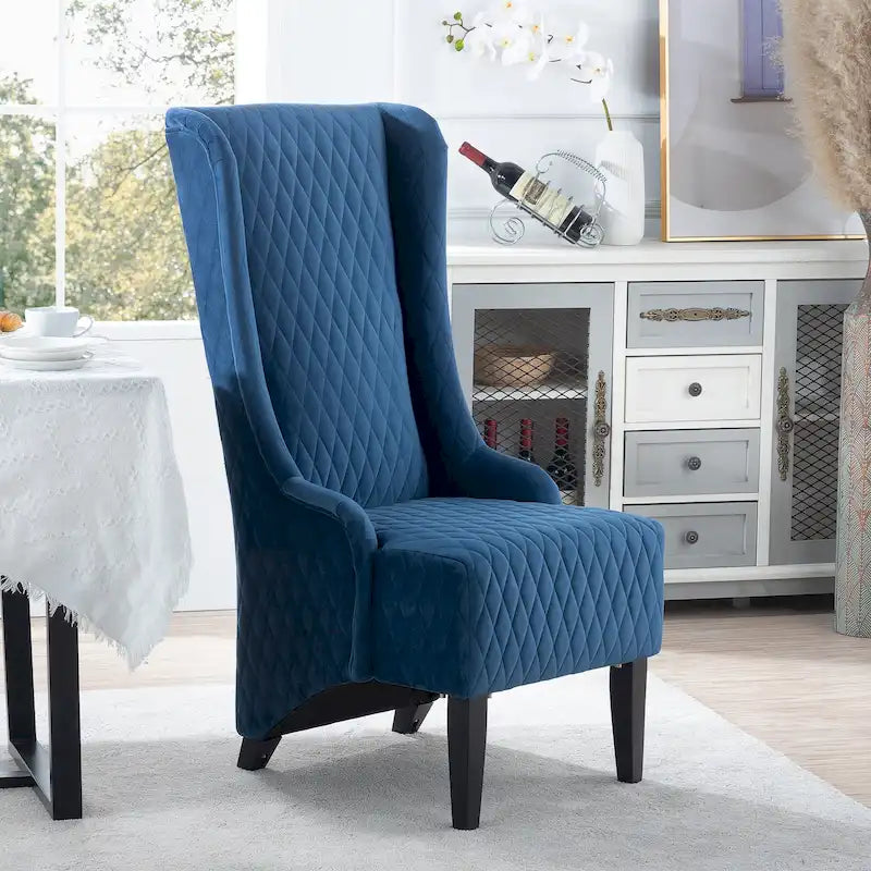 Fauteuil d'appoint en velours capitonné avec haut dossier à oreilles et pieds en bois