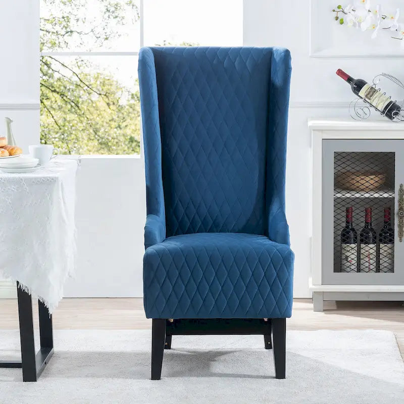 Fauteuil d'appoint en velours capitonné avec haut dossier à oreilles et pieds en bois