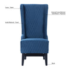Fauteuil d'appoint en velours capitonné avec haut dossier à oreilles et pieds en bois