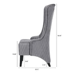 Fauteuil d'appoint en velours capitonné avec haut dossier à oreilles et pieds en bois