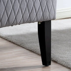 Fauteuil d'appoint en velours capitonné avec haut dossier à oreilles et pieds en bois